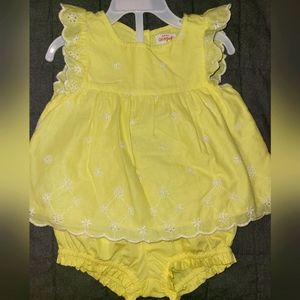 Adorable yellow 2 piece summer outfit with embroidered accent.